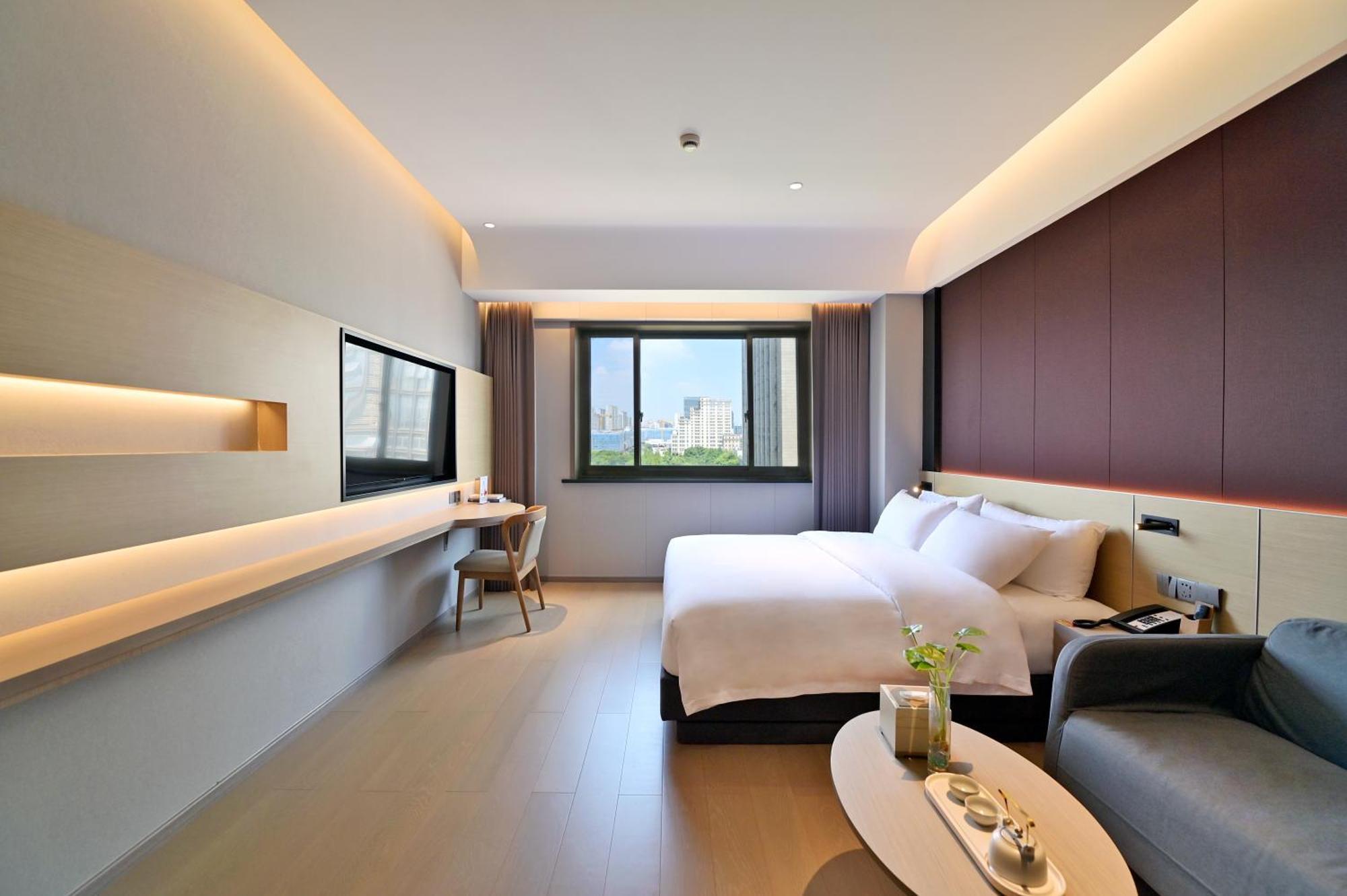 Maison New Century Tongxiang Dış mekan fotoğraf