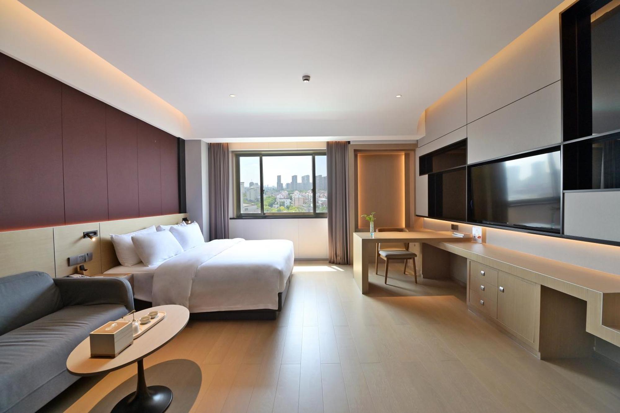 Maison New Century Tongxiang Dış mekan fotoğraf